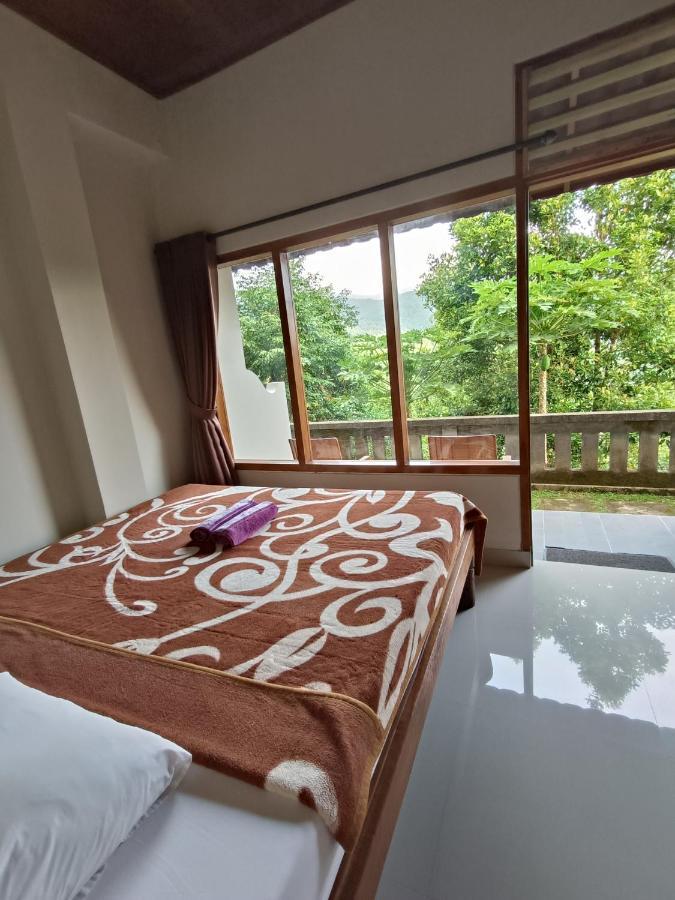 Made Oka Budget Room Мундук Экстерьер фото